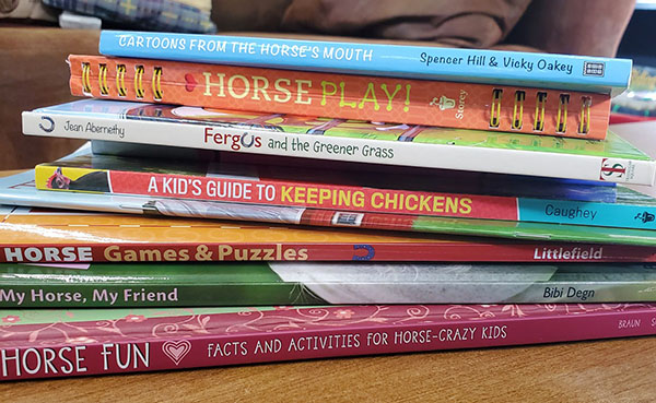 Stack of horse-themed kids' books