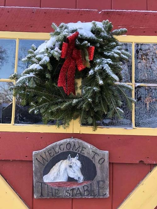 Holiday wreath on barn